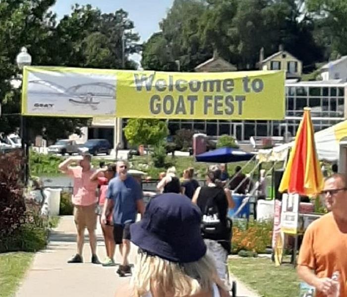 Banner hanging over attending people welcoming them to GOAT Fest