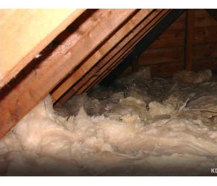 An image of asbestos in an attic
