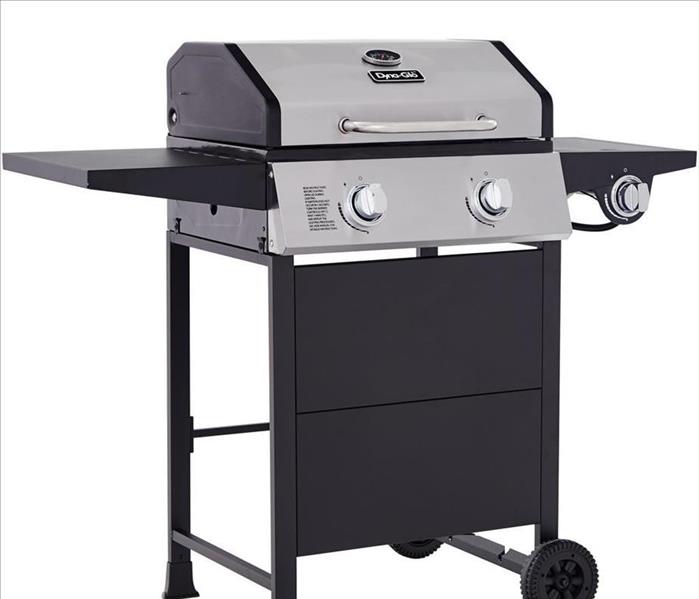A black grill sits with nothing else surrounding it