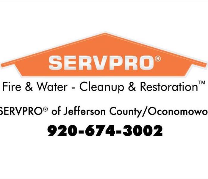 SERVPRO orange house with the words water cleanup and restoration and the phone number