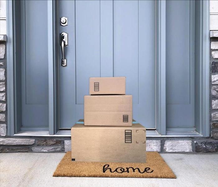 3 boxes left at a home front door